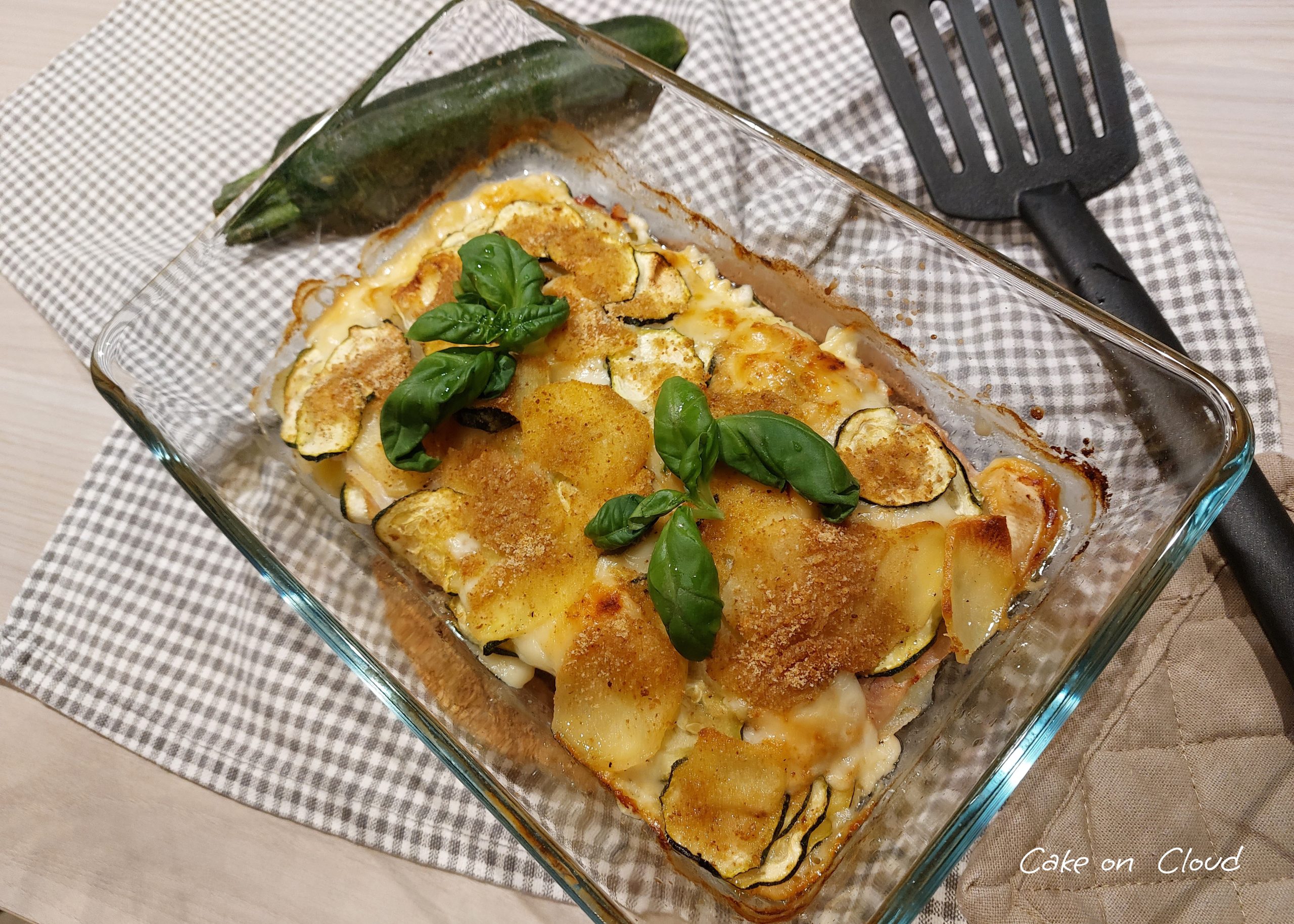 Parmigiana bianca di zucchine e patate