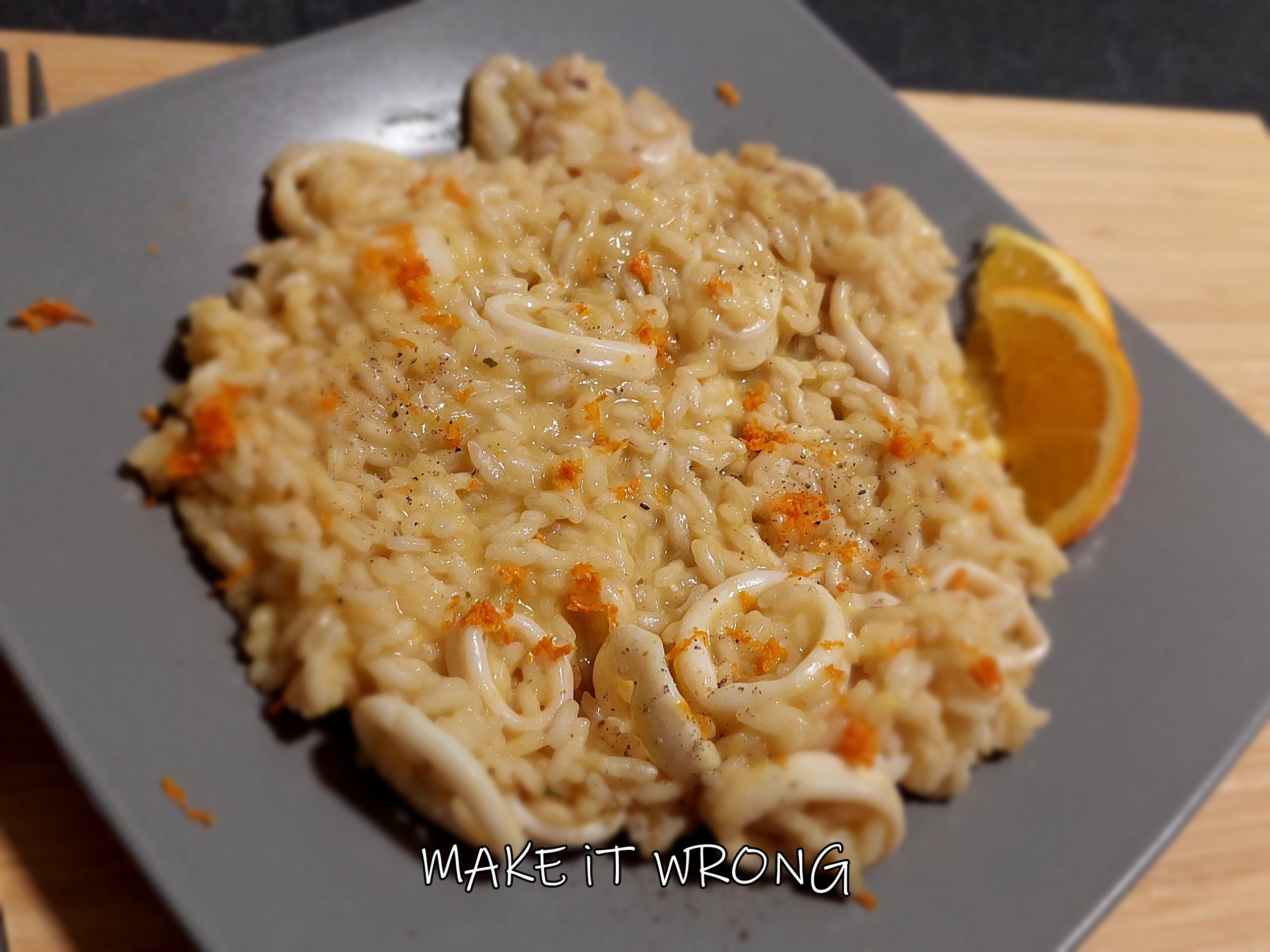 Risotto arancia e calamari